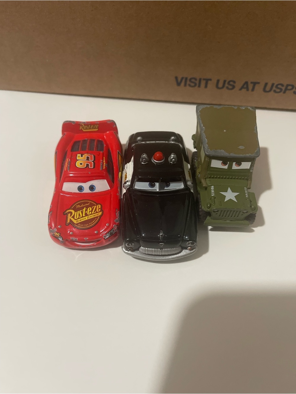 Mattel Cars Lightning McQueen, Black Sedan & Olive Army Jeep Set